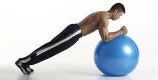 A man doing ball plank exercise at Fidel Integrated Medical Solutions, Pikesville, MD