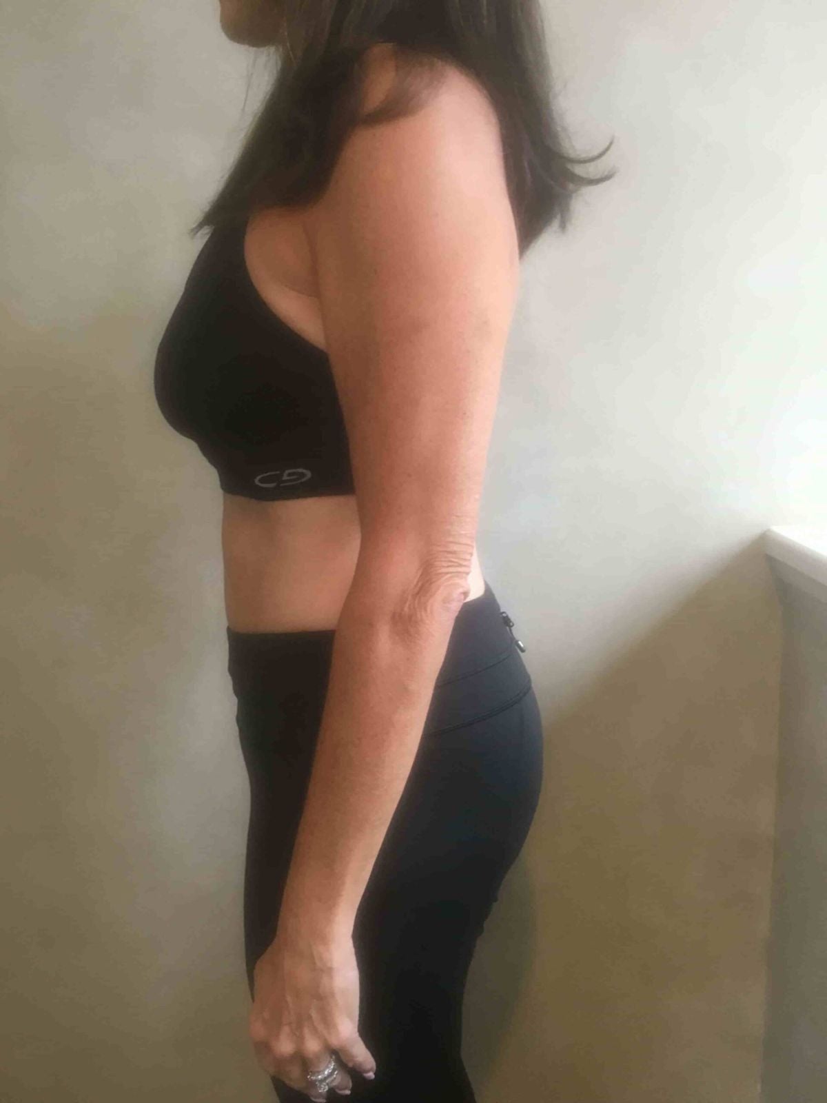 Happy Woman Showing Her Slim Figure After Successful Weight Loss Program