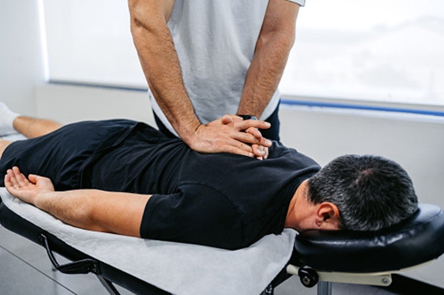 A man is getting a stress relief massage in Pikesville, MD