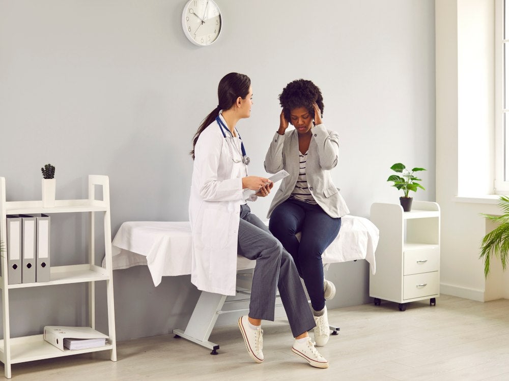 Female patient visits doctor and complains about headache.