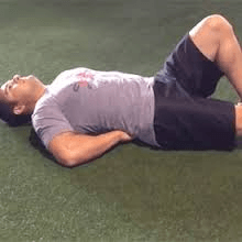 Young Boy Doing Curl-Up Exercise In Pikesville, MD
